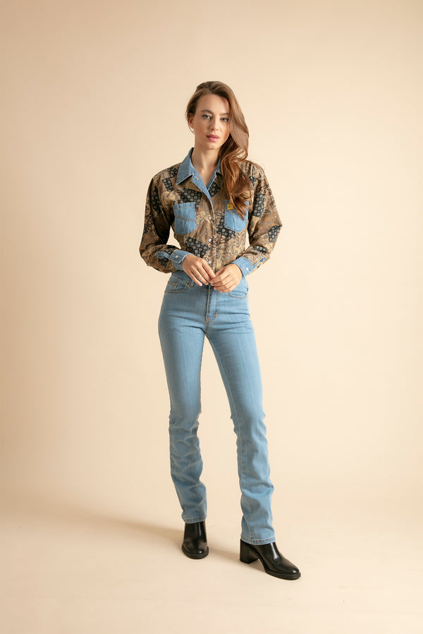 Women's straight jeans paired with printed shirt
