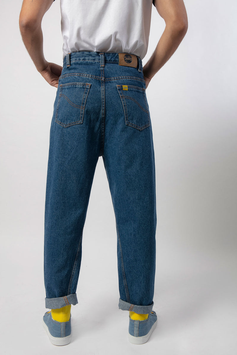 Rear view of men's wide denim trousers
