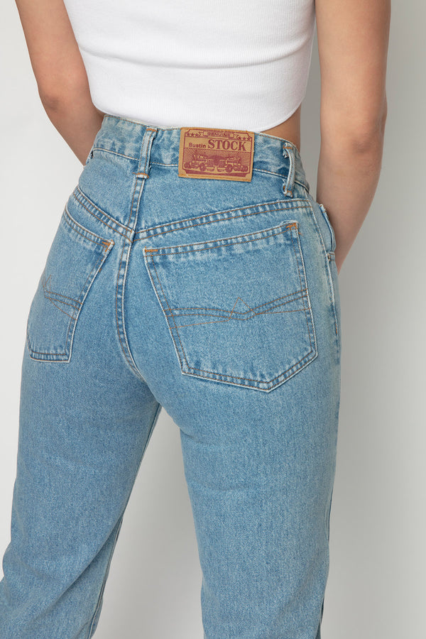 Women's light blue jeans with back view